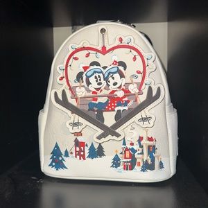 Minnie and Mickey skiing loungefly